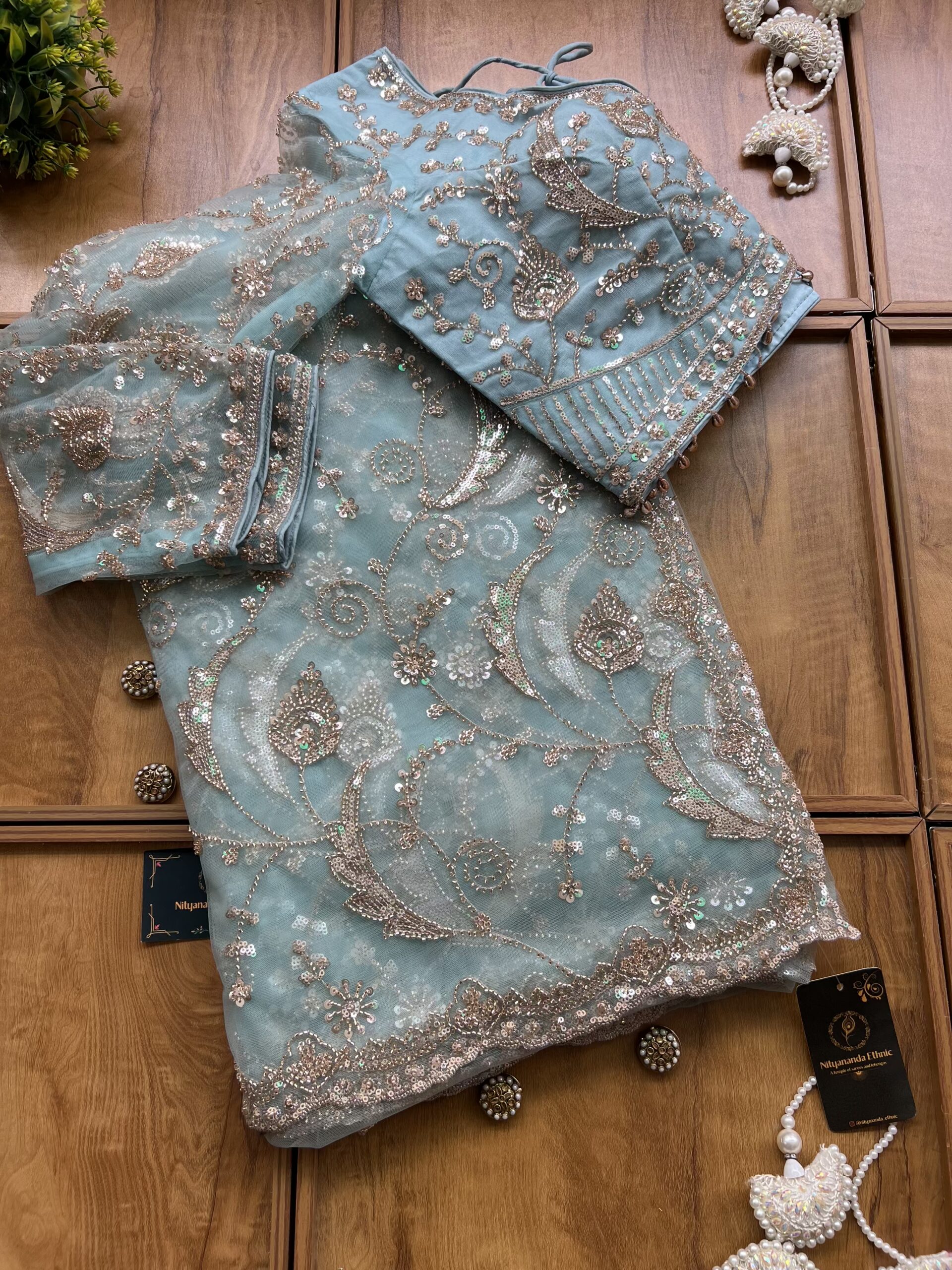 Powder Blue Net Peacock Feather Design Saree with Stitched Blouse