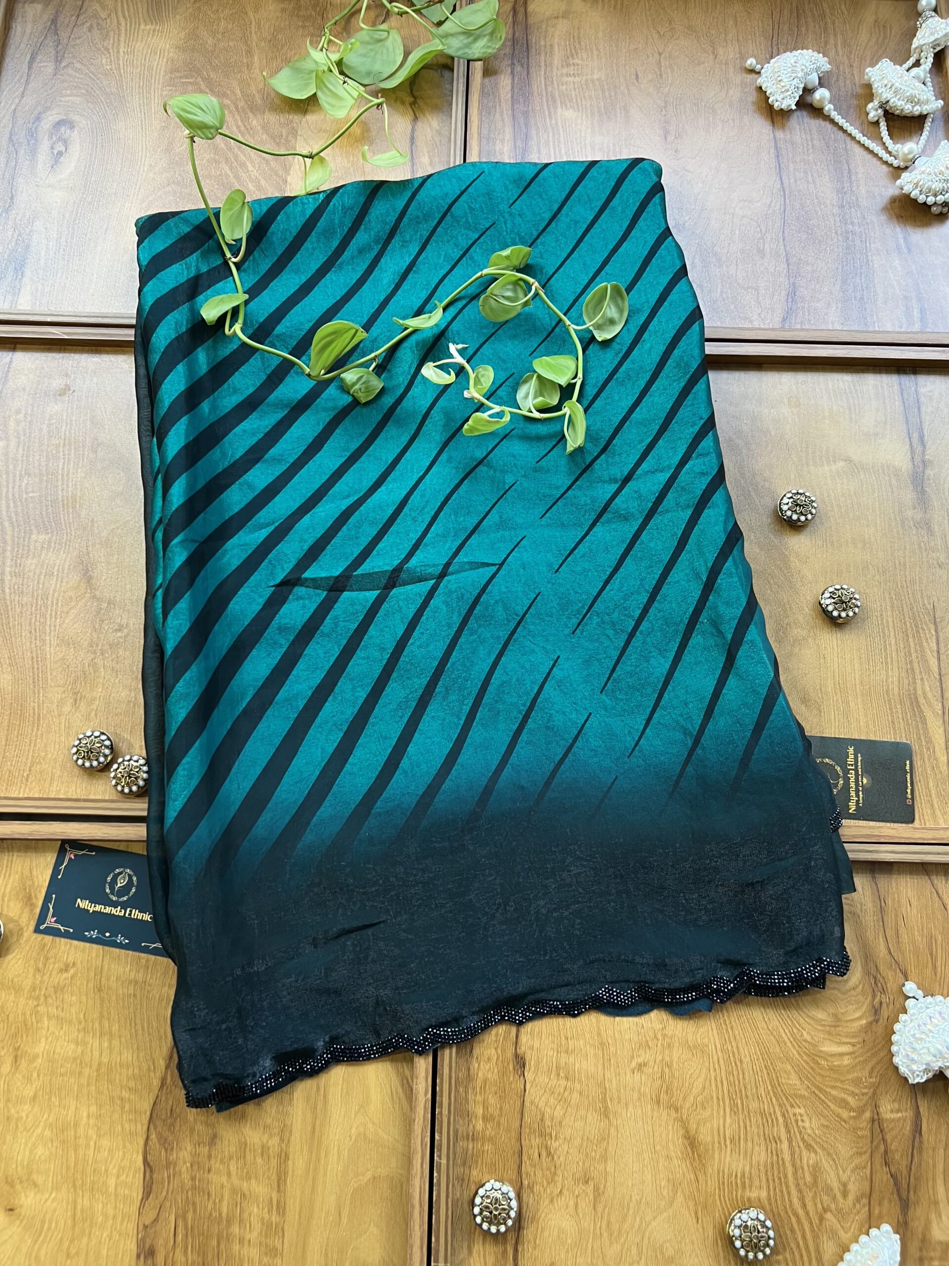 Deep Rama Green Black Leheriya Fendi Silk Saree with Stone Border
