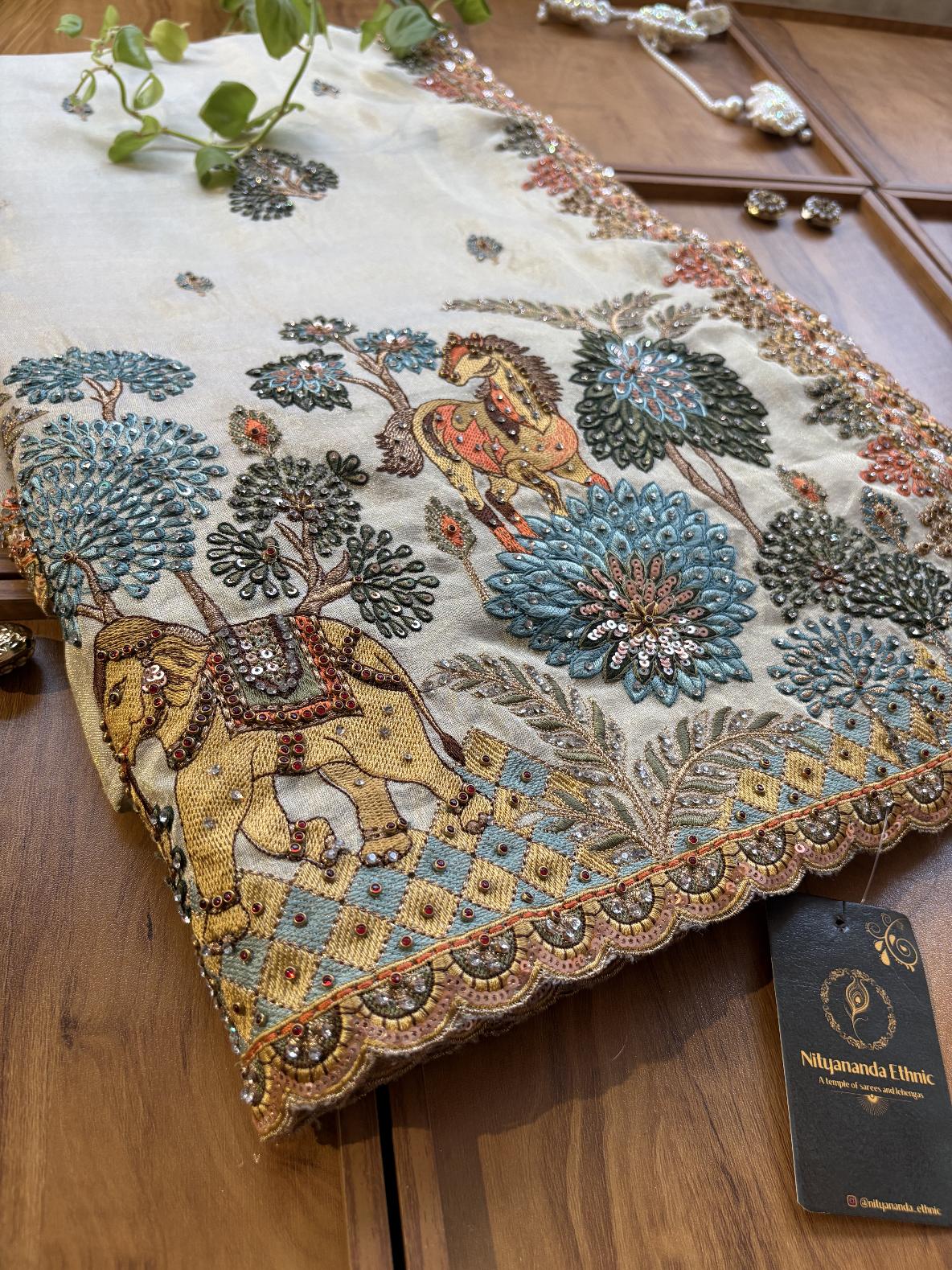 Ivory Gold Cosmos Silk Hathi Ghoda Saree with Scenic Artwork & Stitched Blouse - Image 3